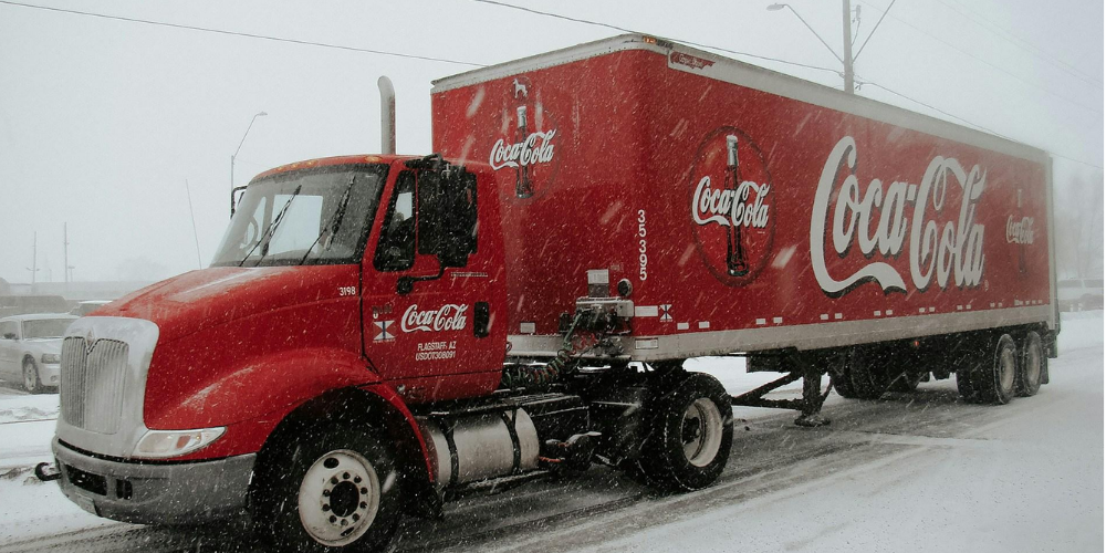 The-iconic-Christmas-Coca-Cola-lorry-driving-through-snow